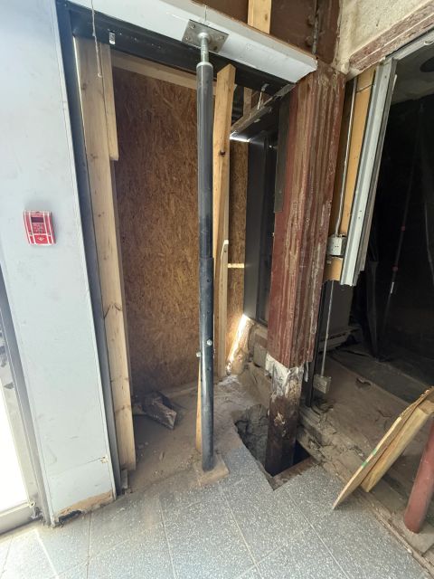 Opened entry wall around structural column