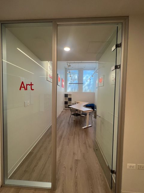 Glass door at the entrance to an art activity room